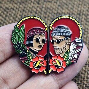 Léon 1994 ActionCrime Heart-Shaped Enamel Pin with Red and Black Design